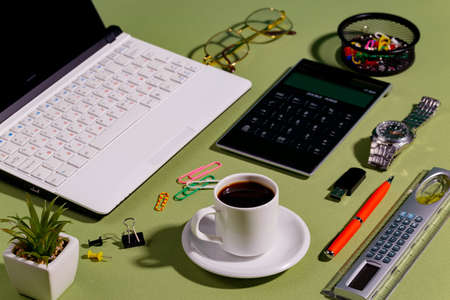 Items for business on bright colors in the office on the tableの写真素材