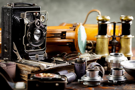 Old camera on the background of the old camera. Vintage photography.