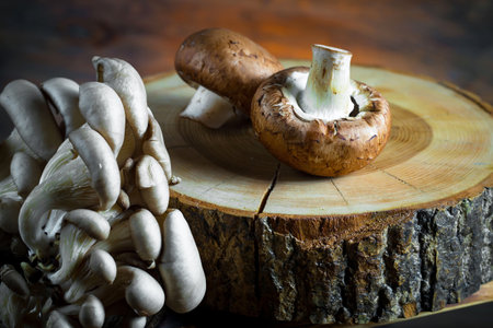 Shiitake mushrooms on a wooden cutting board. Selective focus.の写真素材