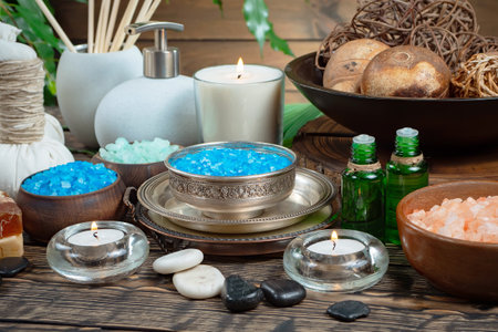 Spa still life with sea salt, soap and candles on wooden backgroundの写真素材