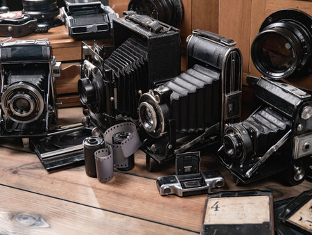 Old camera on a wooden table. Vintage camera on a wooden table