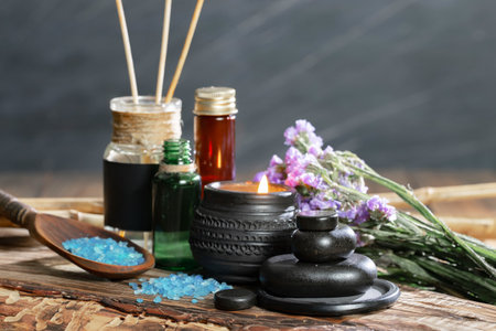 Beautiful spa composition with aroma sticks on wooden table, closeupの写真素材