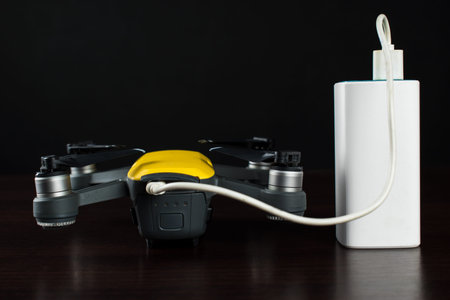 The quadrocopter is charged from a powerbank via a USB cable.