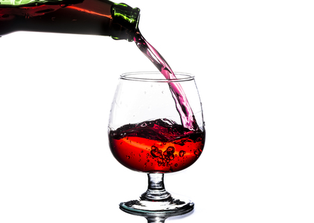 pour in the red wine glassの写真素材
