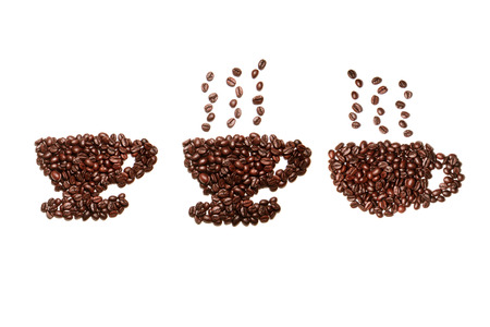 Coffee beans arranged on a white background., isolated on white background. coffee beans arranged in the shape of a cupの写真素材