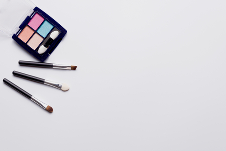 cosmetics on white background top view.の写真素材