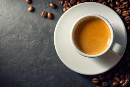 Espresso coffee With coffee beans in the morning background.の写真素材
