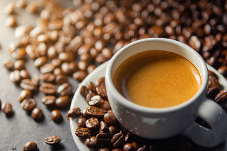 Espresso coffee With coffee beans in the morning background.の写真素材