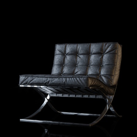 Modern leather armchair on black backgroundの写真素材