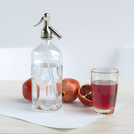 Retro glass jar and fruits on kitchen table. White background.の写真素材