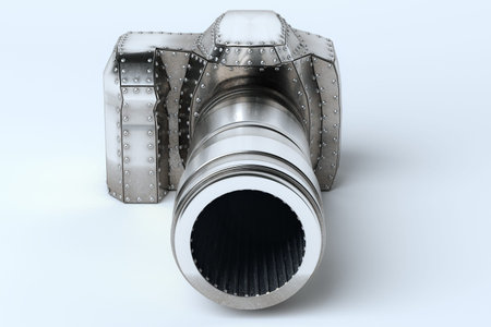 Conceptual Metal (Platinum) Photo Camera On White Background