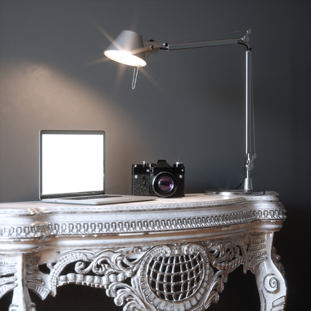 Contemporary office place with laptop, camera and lamp 3d renderの写真素材