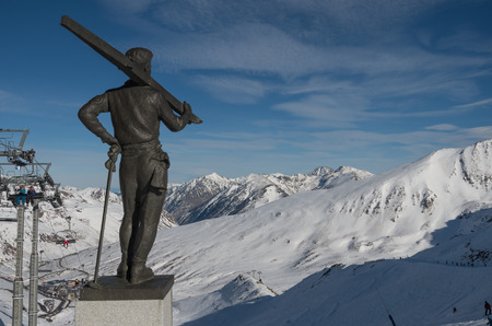 Skiing and snowboarding on the snowy slopes of prepared ski resort in Andorraのeditorial素材
