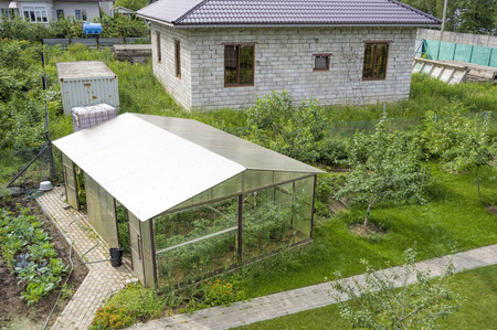 dacha with original gazebo artificial pond and greeneryの写真素材