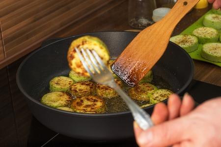 Preparation of fried zucchiniの写真素材