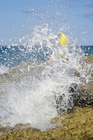 Singing girl on the seaの写真素材