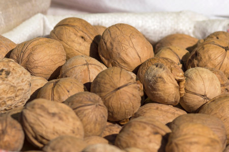 Walnut in a solid peel of brown color. They are used for cooking various dishes, halva, sweets,...