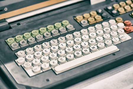 Old dirty computer keyboard with round buttons, closeup fragment. Toning