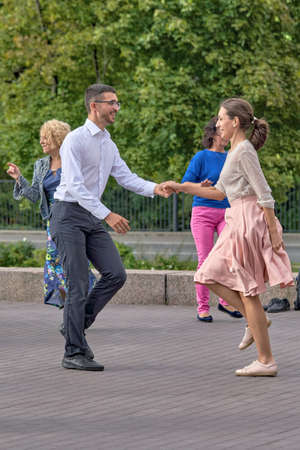 Dancing couples in the city park, summer Petersburgのeditorial素材