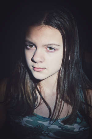 Facial portrait of cute teenage girl with long hairの写真素材