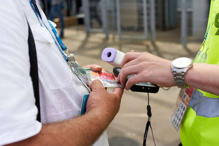 Saint Petersburg, Russia - June 12, 2021: Verification of volunteers documents during Euro 2020 championship in Petersburgのeditorial素材