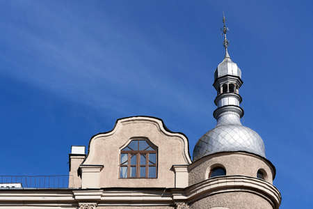 Fragment of an old building close-up, an attic and a dome of an outbuildingの写真素材