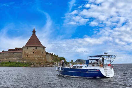 Saint Petersburg, Russia - August 09, 2021: An excursion group visits the sights of the Oreshek fortress near St. Petersburgのeditorial素材