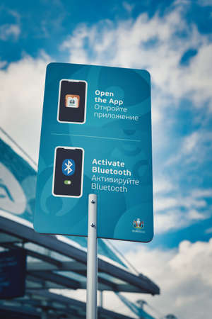 plate with signs for connecting gadgets with Euro 2020 logo onstreet Petersburgのeditorial素材