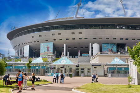 People walk near Zenit Stadium during Euro 2020 championship in St. Petersburgのeditorial素材
