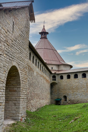 View of the old stone fortress with a watchtower. Fortress Oreshek on a sunny summer day
