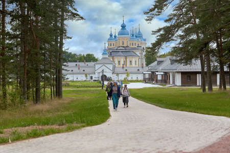 Saint Petersburg, Russia - July 12, 2021: A group of religious pilgrims visited the Konevets Monastery in Russiaのeditorial素材