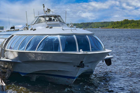 A hydrofoil ship sails along the river. River ship Meteorの写真素材