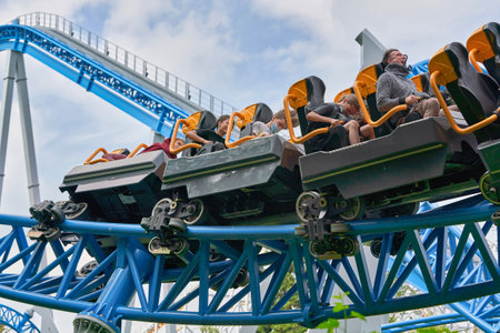 People ride attractions in the city park in St. Petersburgのeditorial素材