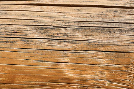 Texture and background from an old cracked board. Wooden brown boardの写真素材
