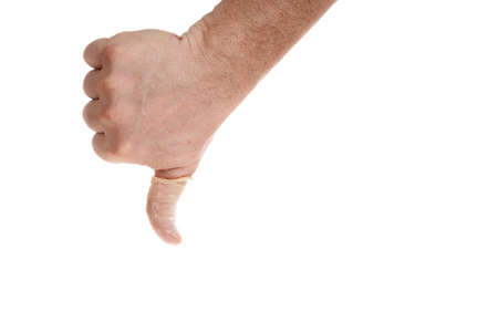 Hand holds a condom on a white background, a template for designers.の写真素材