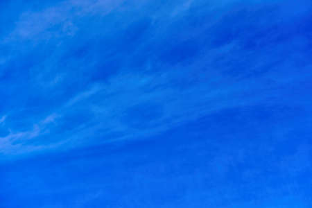 background of clouds of feather clouds on a blue sky.の写真素材