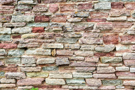 Background from destroyed brick wallの写真素材