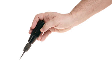 Hand holds an awl on a white background, template for designersの写真素材