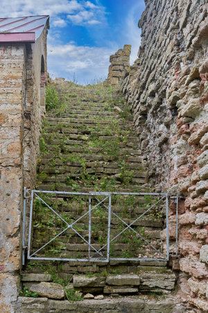 An old stone staircase leading to the skyの写真素材