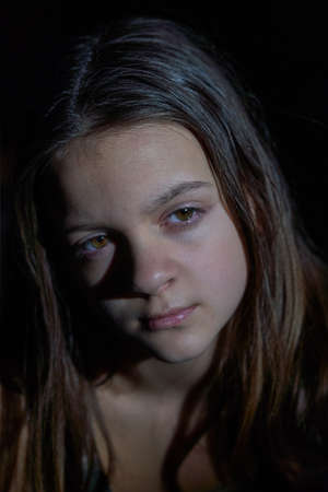 Facial portrait of cute teenage girl with long hairの写真素材