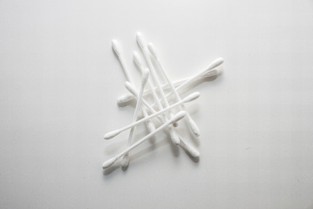 ten cotton buds with white backgroundの写真素材