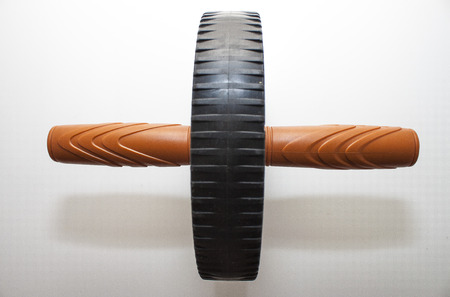 abs roller for abs workout in black color with brown handleの写真素材