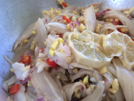 Filipino dish made with fish cooked in vinegar with ginger onions chillies and lime.の素材