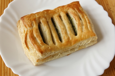 Spinach cake on white dishの写真素材