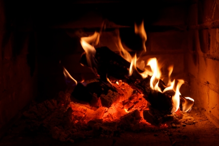 A fire burning in an open fire placeの写真素材