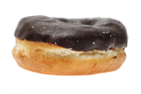  Doughnut covered with chocolate isolated on white .の写真素材