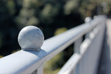 a ball on bridge fenceの写真素材