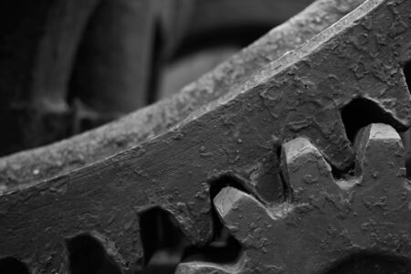Old gears in black oil closeup conceptの写真素材