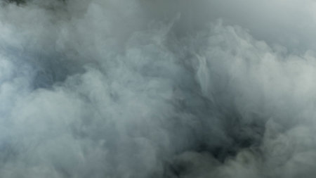 Photo of Realistic Clouds, Smoke, Dry Ice Smoke Texture on black dark Background. For website background, print wallpapers, logo, office or design element, posters and more.の写真素材