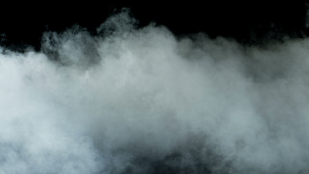 Photo of Realistic Clouds, Smoke, Dry Ice Smoke Texture on black dark Background. For website background, print wallpapers, office or design element, posters and more.の写真素材